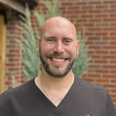 A headshot of Dr. Andrew Walker, a chiropractor at Solid Rock Chiropractic.